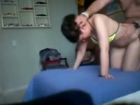 Doggy style sex of a naughty couple in the bedroom